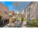Tranquil backyard features a patio area, a dining set, a grill, and an orange umbrella at 34 W Maple Ave, Denver, CO 80223