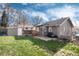 The backyard includes a small patio and a storage shed at 2754 S Sherman St, Englewood, CO 80113