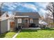 Home exterior showing a back patio area and storage shed at 2754 S Sherman St, Englewood, CO 80113