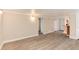 Finished basement featuring vinyl flooring and neutral paint at 2754 S Sherman St, Englewood, CO 80113
