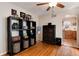 Bright dining room with hardwood floors, a ceiling fan, and ample storage space, adjacent to the kitchen at 2754 S Sherman St, Englewood, CO 80113