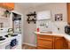 Cozy kitchen with butcher block countertop and view to fenced yard at 2754 S Sherman St, Englewood, CO 80113