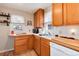 Functional kitchen with tile countertops and white appliances, ready for preparing delicious meals at 2754 S Sherman St, Englewood, CO 80113