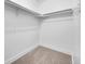 Walk-in closet with carpet and white walls at 1344 Sable Blvd, Aurora, CO 80011