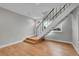 Foyer with hardwood floors and staircase at 1344 Sable Blvd, Aurora, CO 80011