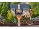 Beautiful aerial view of a well-maintained home, showcasing its manicured landscaping, balcony, and inviting outdoor space at 6901 E 12Th Ave, Denver, CO 80220