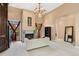Spacious bedroom with a fireplace, a vaulted ceiling, and a neutral color palette at 6901 E 12Th Ave, Denver, CO 80220