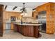 Gourmet kitchen with a large center island and stainless steel appliances at 6901 E 12Th Ave, Denver, CO 80220