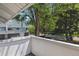 Balcony area showcasing townhome-style architecture, garages, and mature landscaping at 262 S Nome St, Aurora, CO 80012