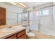Bright bathroom featuring a tub and shower combination and ample counter space at 262 S Nome St, Aurora, CO 80012