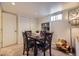 Basement dining area with table and four chairs at 2354 S Ogden St, Denver, CO 80210