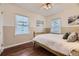 Bright bedroom with wood floors and a comfortable bed at 2354 S Ogden St, Denver, CO 80210