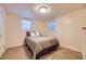 Cozy bedroom with double bed, carpet flooring, and window coverings at 2354 S Ogden St, Denver, CO 80210