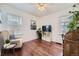 Home office with hardwood floors and built-in shelving at 2354 S Ogden St, Denver, CO 80210