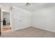 Bright, carpeted bedroom with fresh paint and a convenient closet door at 6193 Holland St, Arvada, CO 80004