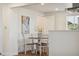 Kitchen dinette area with modern appliances and charming decor at 6193 Holland St, Arvada, CO 80004