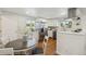 Well-lit kitchen with stainless steel appliances and updated cabinetry at 6193 Holland St, Arvada, CO 80004