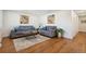 Cozy living room with hardwood floors, stylish decor and comfortable seating at 6193 Holland St, Arvada, CO 80004
