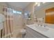 Cozy bathroom with a shower and tub, a vanity, and modern finishes at 13472 Monroe St, Thornton, CO 80241