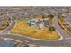 An aerial view of the community amenities, including a pool, playground, and park, providing residents with recreation options at 13472 Monroe St, Thornton, CO 80241