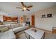 The spacious living room opens to the eat-in kitchen at 13472 Monroe St, Thornton, CO 80241