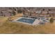 Aerial view of fenced community pool with cover, clubhouse, playground, and grassy areas in a residential neighborhood at 13472 Monroe St, Thornton, CO 80241
