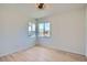 Cozy bedroom featuring hardwood floors, light gray walls and double paned windows at 851 S Umatilla Way, Denver, CO 80223
