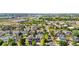 Wide aerial view featuring a lovely community, well-manicured lawns and many single Gathering homes at 11545 E 119Th Ave, Commerce City, CO 80640