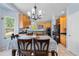 Dining room with a view of the kitchen and backyard at 11545 E 119Th Ave, Commerce City, CO 80640