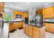 Kitchen with stainless steel appliances, island, and eat-in dining at 11545 E 119Th Ave, Commerce City, CO 80640