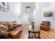 Inviting living room boasting high ceilings, large windows, and stylish decor at 11545 E 119Th Ave, Commerce City, CO 80640