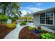 Landscaped backyard with stamped concrete pathway at 2775 E Dartmouth Ave, Denver, CO 80210