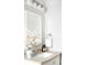 Bathroom boasts a vanity with vessel sink, and modern fixtures at 2775 E Dartmouth Ave, Denver, CO 80210