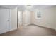 Basement bedroom with carpeted floors and window at 2775 E Dartmouth Ave, Denver, CO 80210