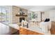 Living room with a stone fireplace and hardwood floors at 2775 E Dartmouth Ave, Denver, CO 80210