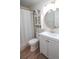 Clean bathroom with white vanity, toilet, and shower at 2245 E 103Rd Pl, Thornton, CO 80229