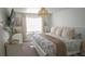 Spacious main bedroom with a king-size bed and ample closet space at 2245 E 103Rd Pl, Thornton, CO 80229