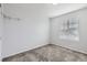 Simple bedroom with gray carpeting and a window with blinds at 10288 Salida St, Commerce City, CO 80022