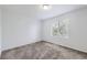 Bright bedroom with neutral carpeting and window coverings at 10288 Salida St, Commerce City, CO 80022