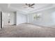 Spacious main bedroom features tray ceilings, neutral carpet, and great lighting at 10288 Salida St, Commerce City, CO 80022