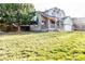 Charming two-story home with a well-manicured front yard, covered porch, and welcoming curb appeal at 17020 W 64Th Dr, Arvada, CO 80007