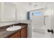 Bathroom features include vanity sink and shower-tub at 1771 W 53Rd Pl # 1, Denver, CO 80221