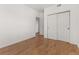 Bedroom has wood floors and sliding door closet at 1771 W 53Rd Pl # 1, Denver, CO 80221