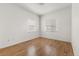 This bedroom includes wood floors and lots of natural light at 1771 W 53Rd Pl # 1, Denver, CO 80221
