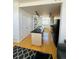 Modern kitchen featuring a central island, track lighting, wine rack and stainless steel appliances at 500 30Th St # 5, Denver, CO 80205