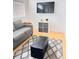 Cozy living room with modern furniture and a view of the city skyline at 500 30Th St # 5, Denver, CO 80205