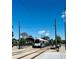 Daytime shot of a light rail train at the station at 500 30Th St # 5, Denver, CO 80205