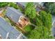 Aerial view of the property showcasing a landscaped yard, back deck and proximity to surrounding neighborhood at 2829 N Franklin St, Denver, CO 80205