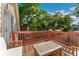 Wooden balcony with wood furnishings overlooking the yard, perfect for relaxation at 2829 N Franklin St, Denver, CO 80205