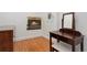 Bedroom with wood burning fireplace and vanity area at 2829 N Franklin St, Denver, CO 80205
